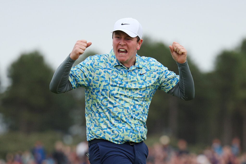 Robert MacIntyre of Scotland celebrates victory on the 18th green during day four of the Genesis Scottish Open
