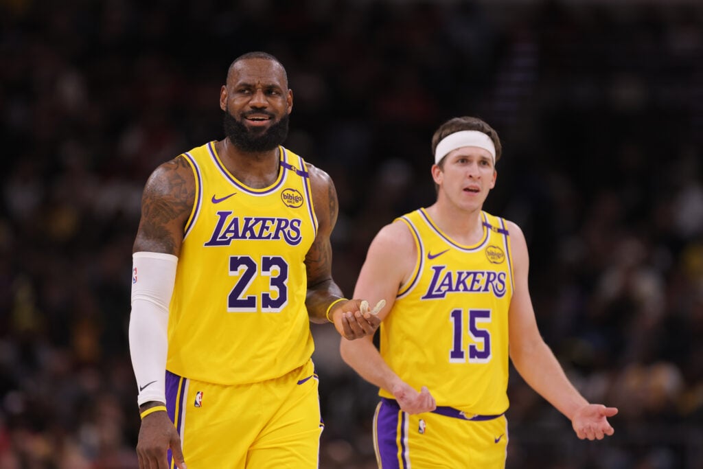 LeBron James #23 of the Los Angeles Lakers and Austin Reaves #15 of the Los Angeles Lakers react to a call during the first half against the Chicago Bulls on March 27, 2025 at the United Center.