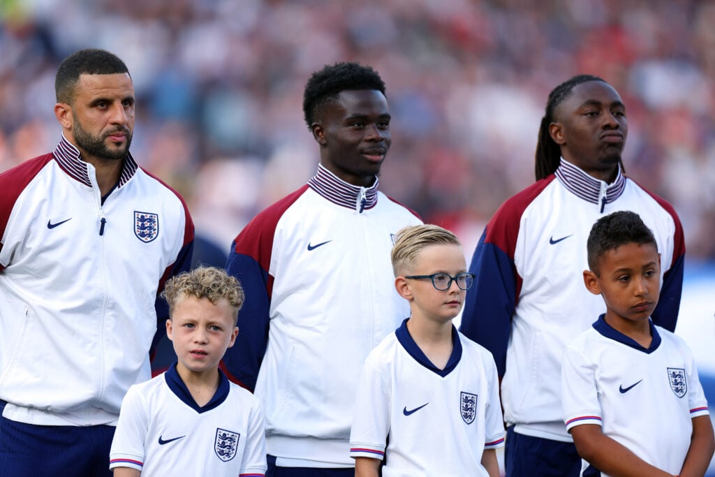 Kyle Walker, Bukayo Saka and Eberechi Eze of England line up for the national anthem prior to the international friendly match between England and Senegal at City Ground on June 10, 2025 in Nottingham, England.