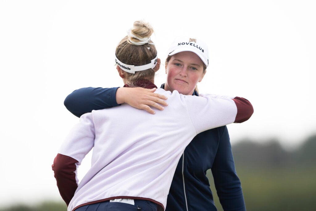 Lottie Woad and Nelly Korda hug after the second round of the Women's Scottish Open