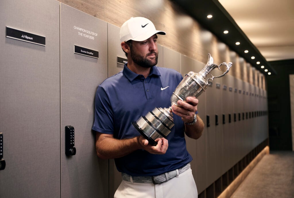 Scottie Scheffler takes part in a photoshoot with the Claret Jug after his Open Championship victory
