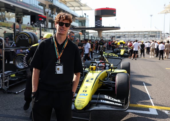 Jannik Sinner on the grid with Roman Stanek of Czech Republic and Invicta Racing (2) during the Round 14 Yas Island Feature race of the Formula 2 Championship at Yas Marina Circuit