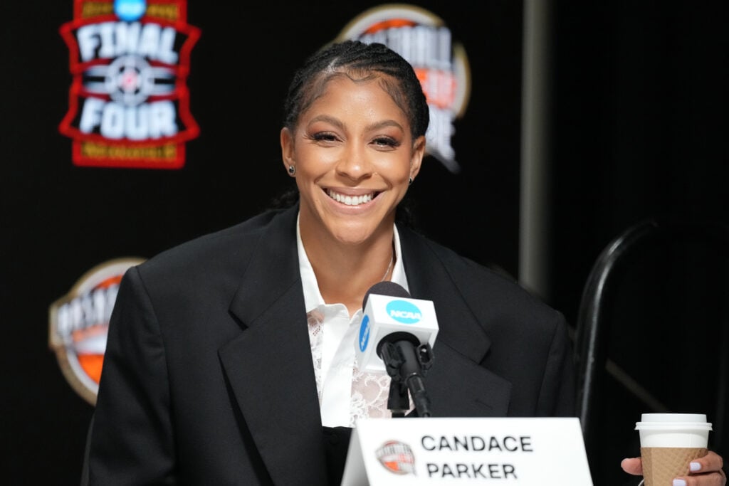 Former WNBA player Candace Parker addresses the media at the 2026 Naismith Hall of Fame Press Announcement Conference at the National Championship of the 2026 NCAA Men's Basketball Tournament at Lucas Oil Stadium.