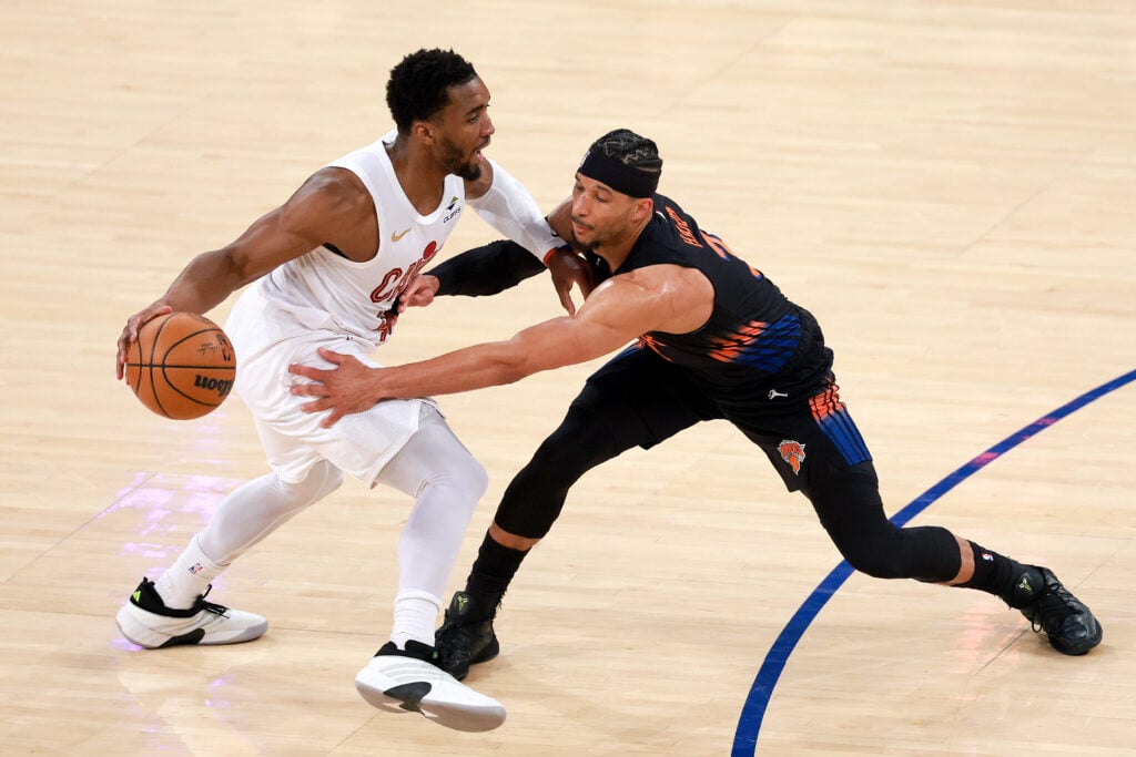 Donovan Mitchell #45 of the Cleveland Cavaliers drives against Josh Hart #3 of the New York Knicks during the first period in Game Two of the NBA Eastern Conference Finals at Madison Square Garden.