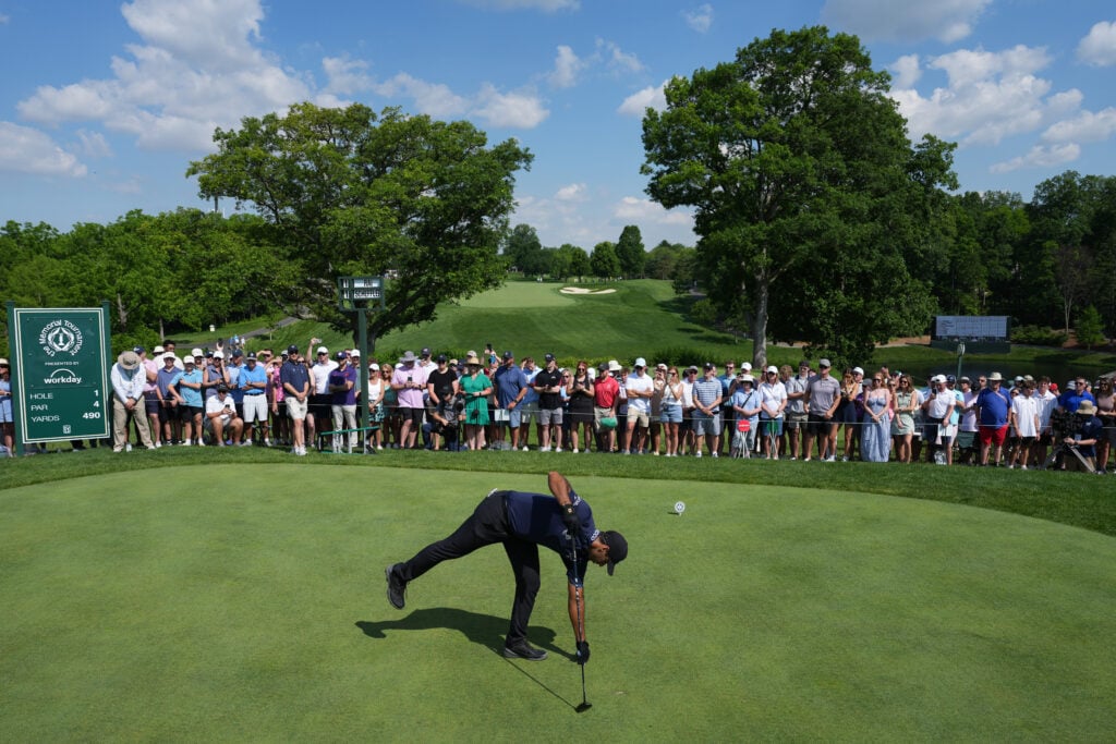 Aaron Rai tees up his ball on the first hole during the second round of the Memorial Tournament