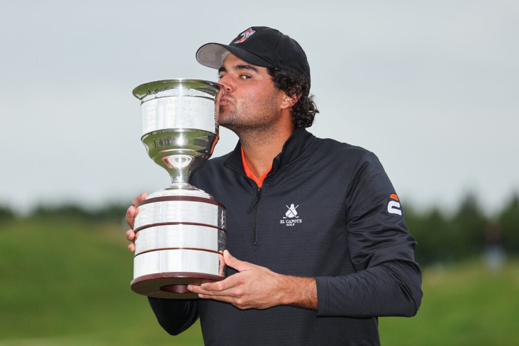 Eugenio Chacarra of Spain poses for a photo with the trophy following victory on day four of the KLM Open 2026
