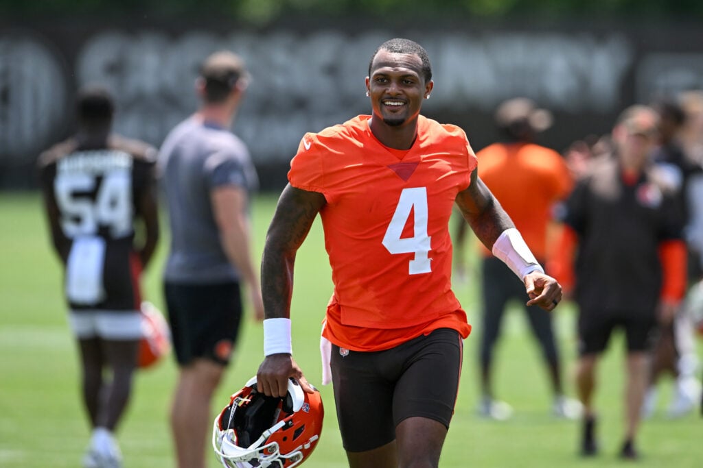 Deshaun Watson #4 of the Cleveland Browns runs off the field after the Cleveland Browns Mandatory Minicamp at CrossCountry Mortgage Campus
