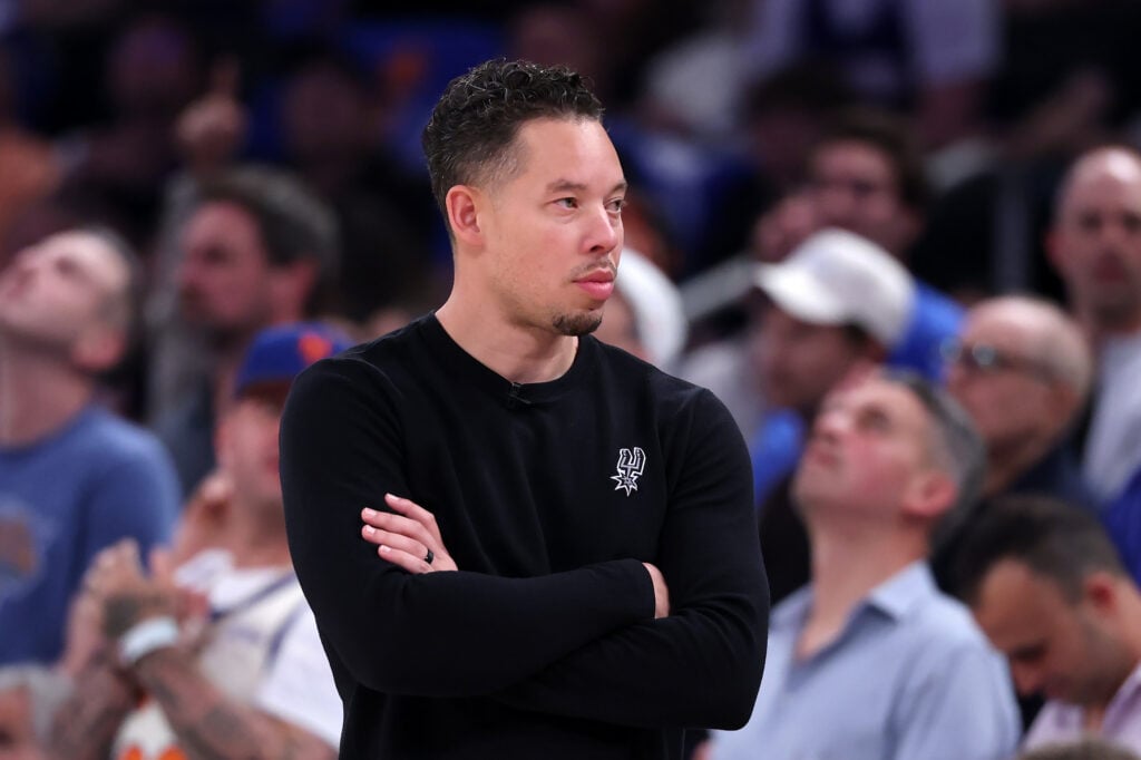Head coach Mitch Johnson of the San Antonio Spurs looks on during the first quarter against the New York Knicks in Game Four of the 2026 NBA Finals at Madison Square Garden.