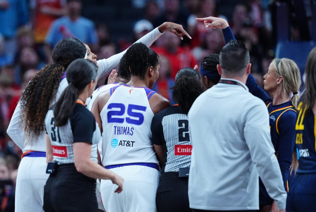 Indiana Fever guard Sophie Cunningham (8) and Phoenix Mercury forward DeWanna Bonner (24) exchange words and point out each other on June 22, 2026, at Gainbridge Fieldhouse in Indianapolis, Indiana.