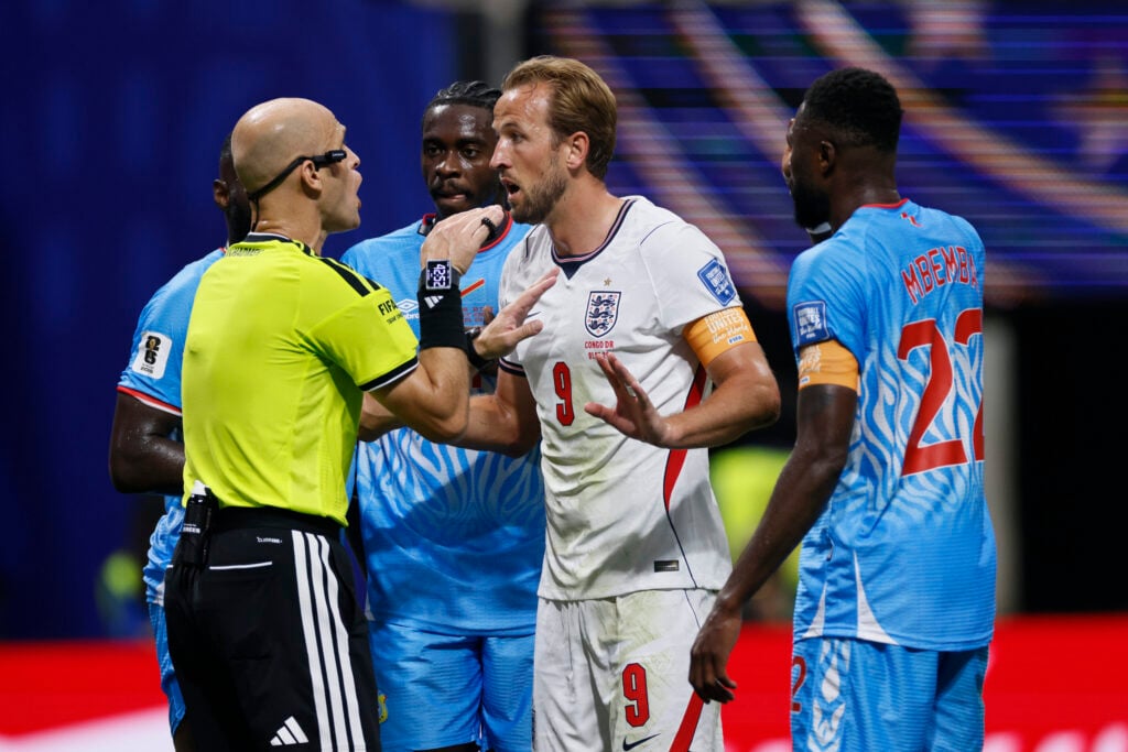 Harry Kane of England complains to referee Adham Makhadmeh during the FIFA World Cup 2026 Round Of 32 match between England and Congo DR at Atlanta Stadium