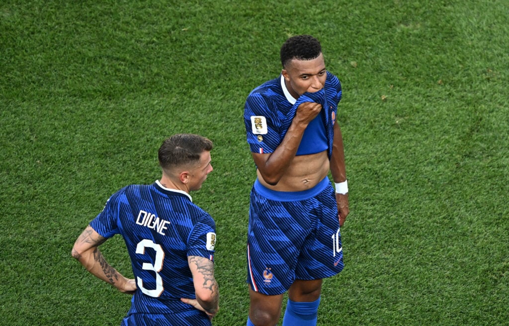 France's forward #10 Kylian Mbappe and teammates take the hydration break during the 2026 World Cup round of 16 football match between Paraguay and France.
