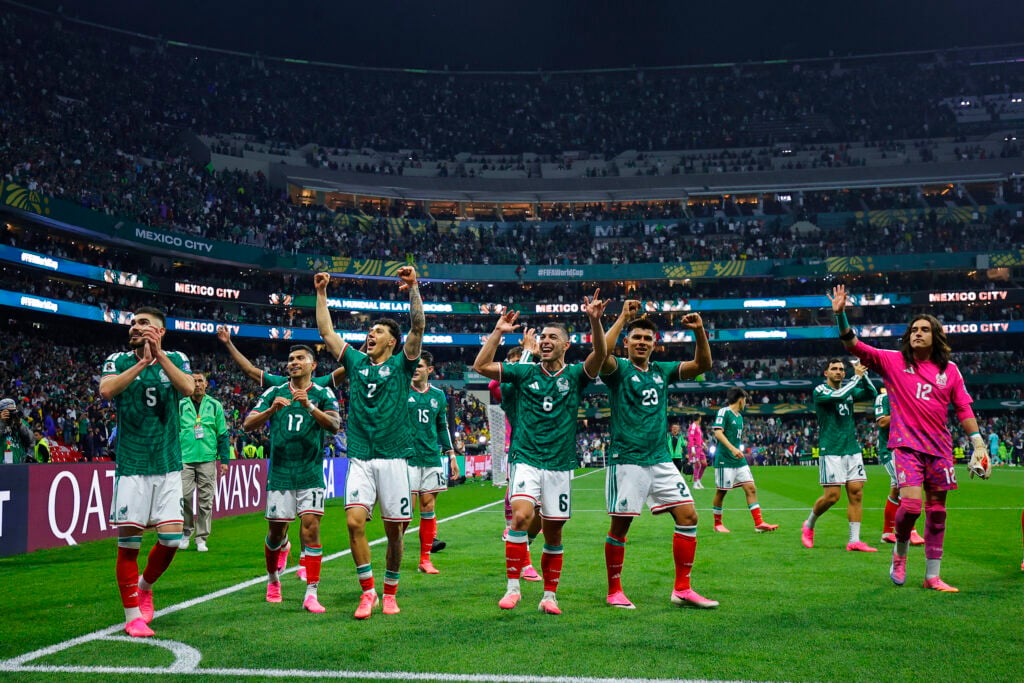 Mexican players celebrate with fans after the victory during the FIFA World Cup 2026 Round Of 32 match between Mexico and Ecuador at Mexico City Stadium