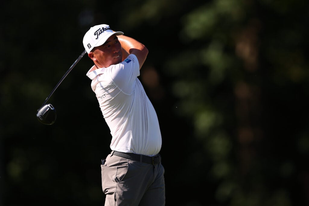 Doug Ghim plays his shot from the 13th tee during the first round of the John Deere Classic 2026 at TPC Deere Run