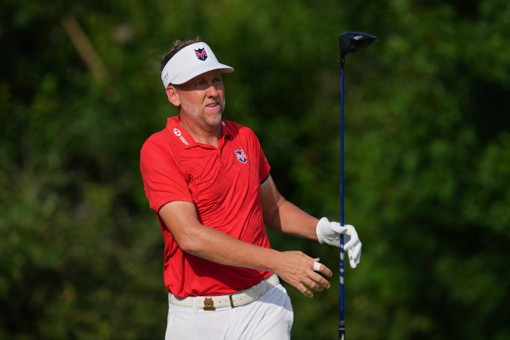 Ian Poulter of England plays a shot from the second tee during the first round of the U.S. Senior Open Championship 2026