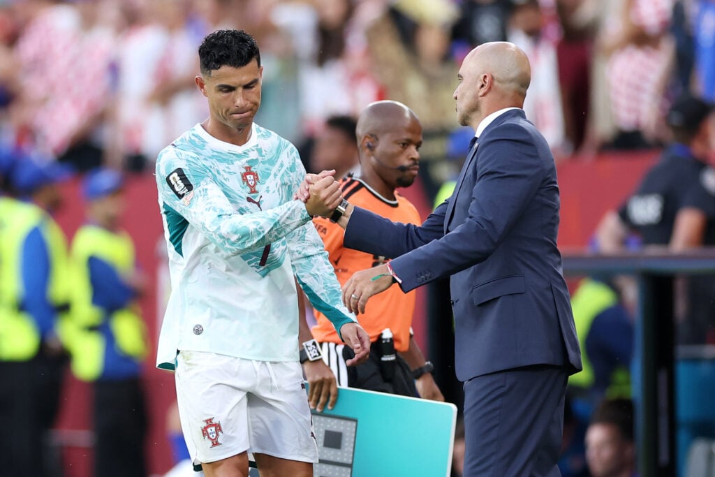 Cristiano Ronaldo (7) of Portugal shakes hands with Portugal head coach Roberto Martinez after being substituted off during the second half of the FIFA World Cup 2026 Round of 32 match between Portugal and Croatia on July 02, 2026, at Toronto Stadium in Toronto, ON.