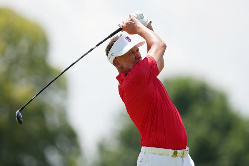Ian Poulter of England plays a shot from the 11th tee during the second round of the U.S. Senior Open Championship 2026