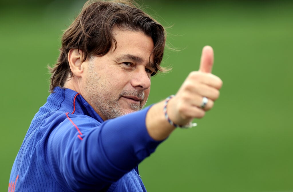 Head coach Mauricio Pochettino of the United States greets members of the media during a training session for the 2026 World Cup at Husky Soccer Stadium.