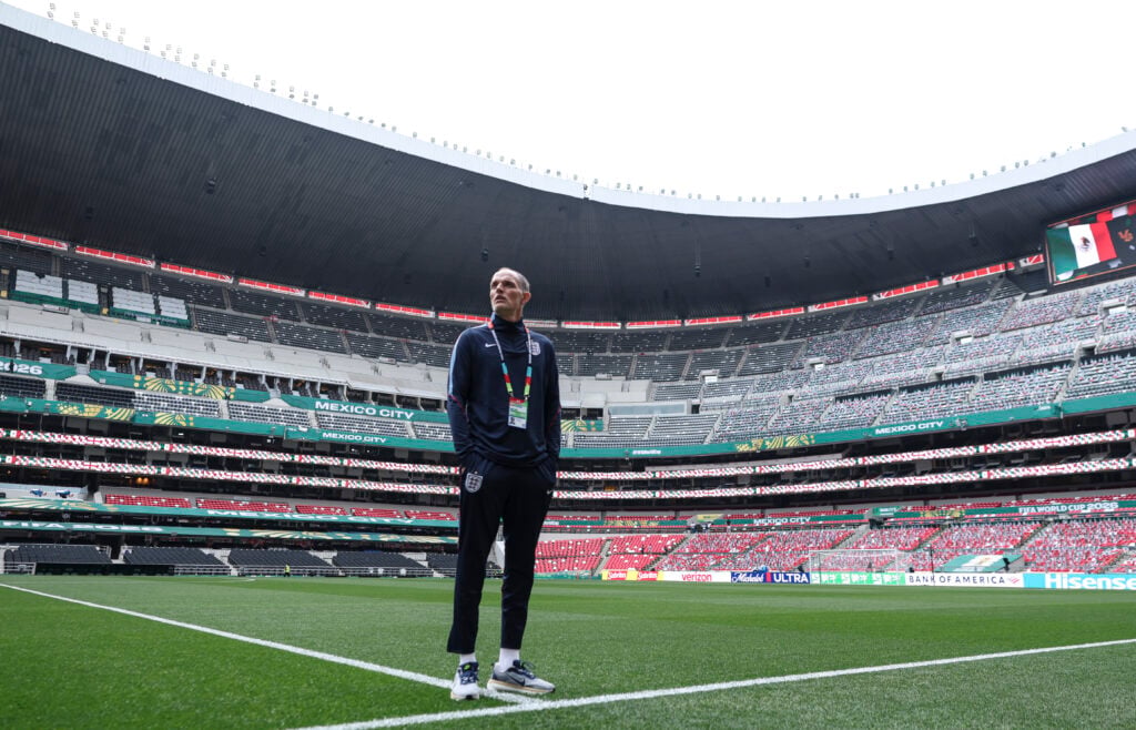 Thomas Tuchel, Manager of England, looks on as he inspects the pitch at the Mexico City Stadium.