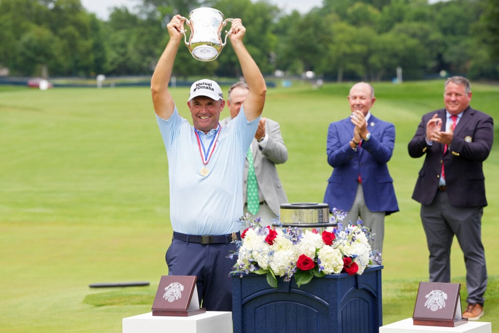 Padraig Harrington lifts the trophy after winning the US Senior Open