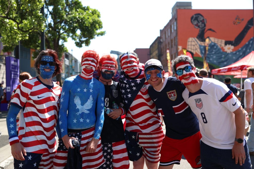 Fans of the United States pose for photographs before the FIFA World Cup 2026 Round of 16 match between USA and Belgium at Seattle Stadium