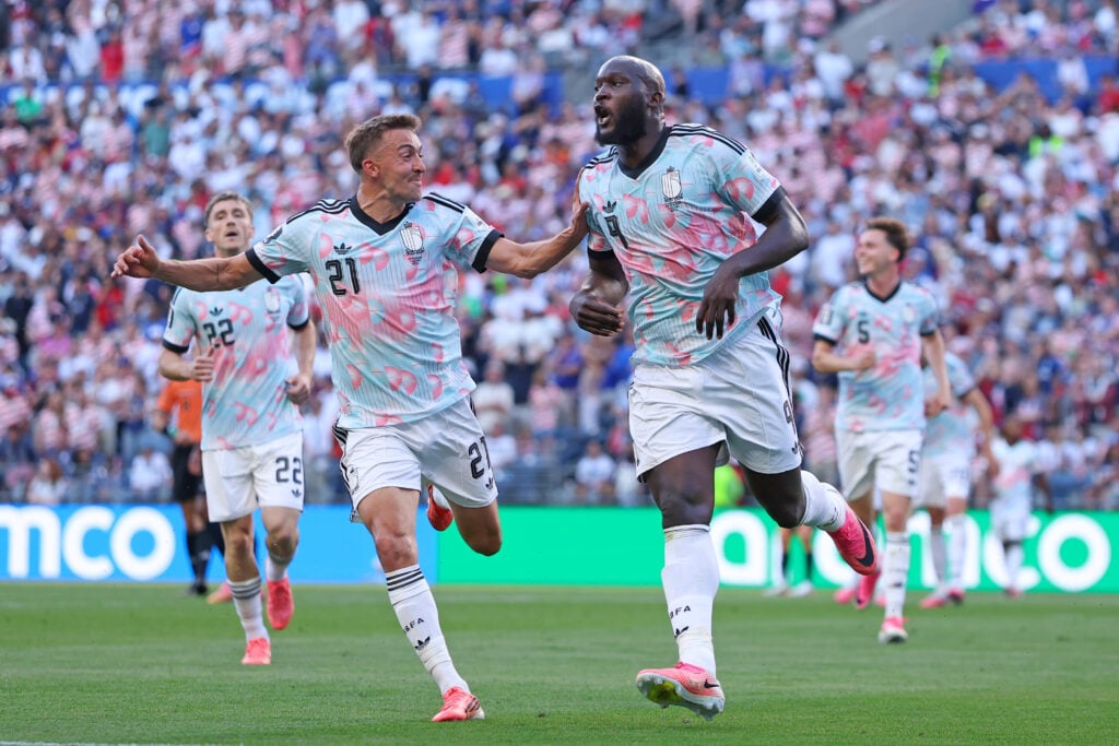 Romelu Lukaku #9 of Belgium celebrates with Timothy Castagne #21 after scoring the team's fourth goal during the FIFA World Cup 2026 Round of 16 match between USA and Belgium at Seattle Stadium.