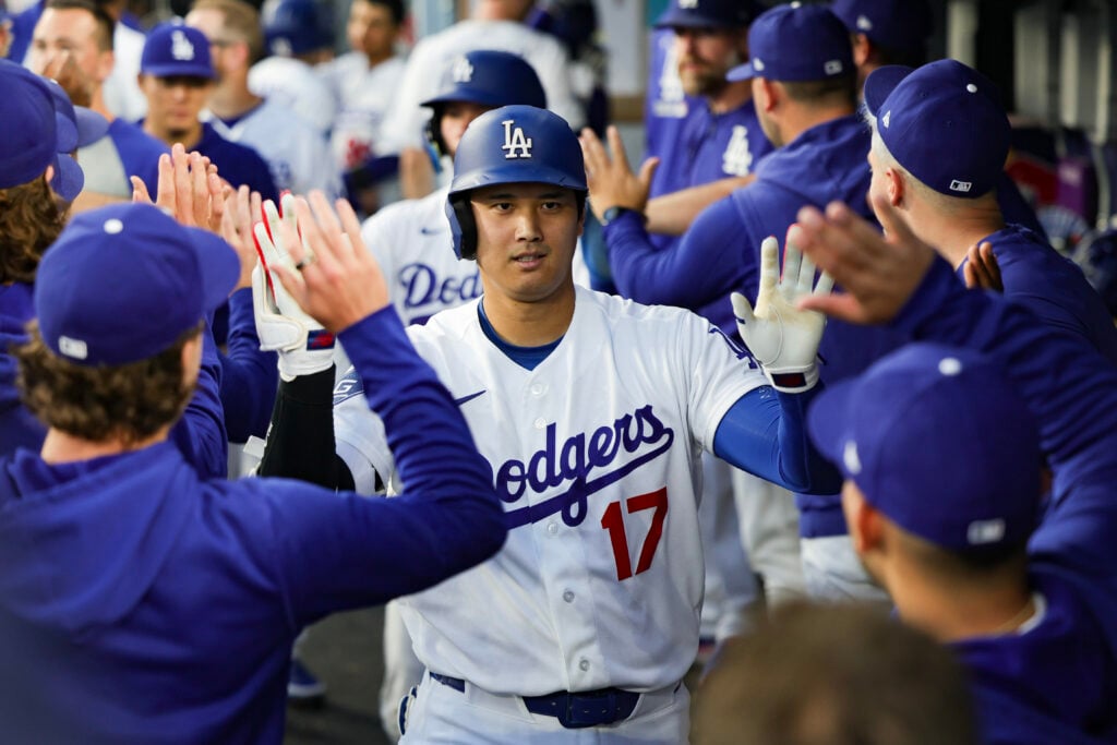 Shohei Ohtani #17 of the Los Angeles Dodgers celebrates in the dugout after hitting a two-run home run during the third inning against the Colorado Rockies at Dodger Stadium on July 06, 2026 in Los Angeles, California.