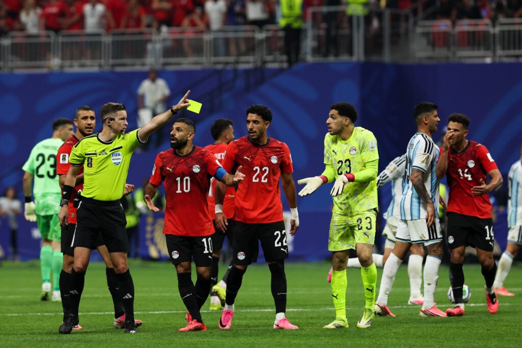 Referee Francois Letexier gives the yellow card to Egypt's players during the FIFA World Cup 2026 Round of 16 match between Argentina and Egypt at Atlanta Stadium on July 07, 2026 in Atlanta, Georgia.