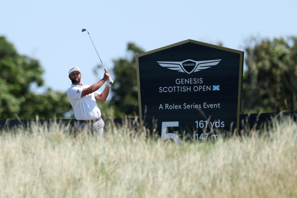 Jon Rahm of Spain tees off during the Pro–am prior to the Genesis Scottish Open 2026 at The Renaissance Club