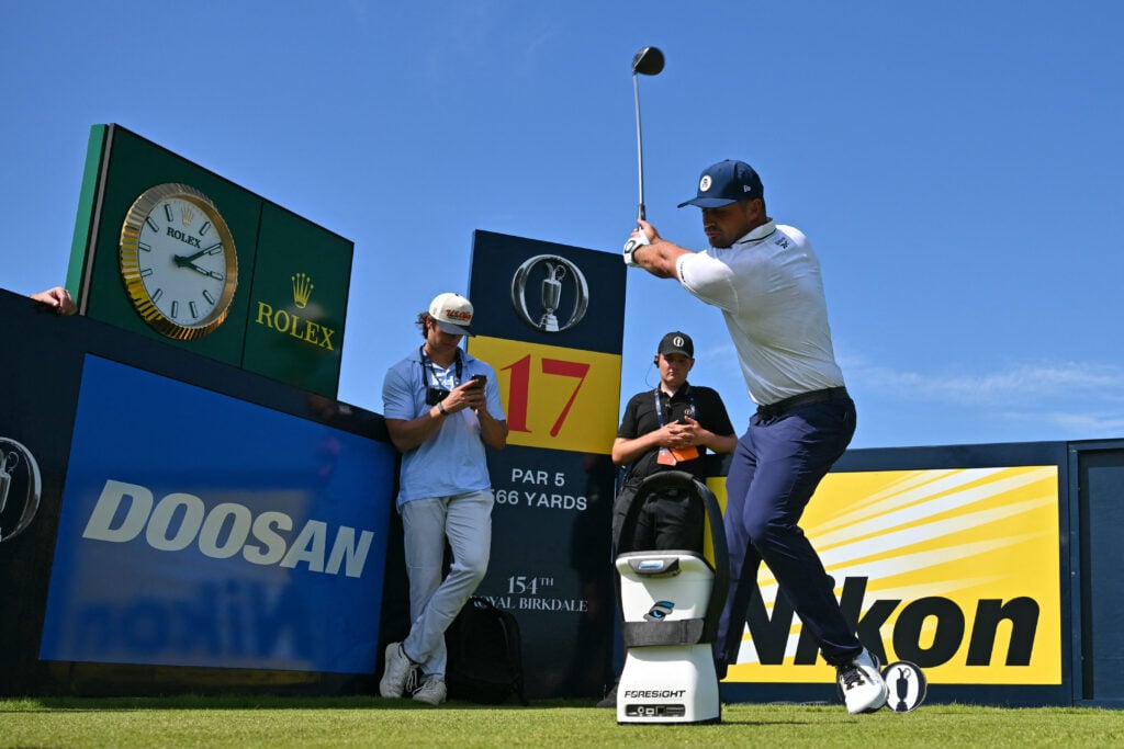 US golfer Bryson DeChambeau drives from the 17th tee during practice for the 154th Open Golf championship at Royal Birkdale Golf Club