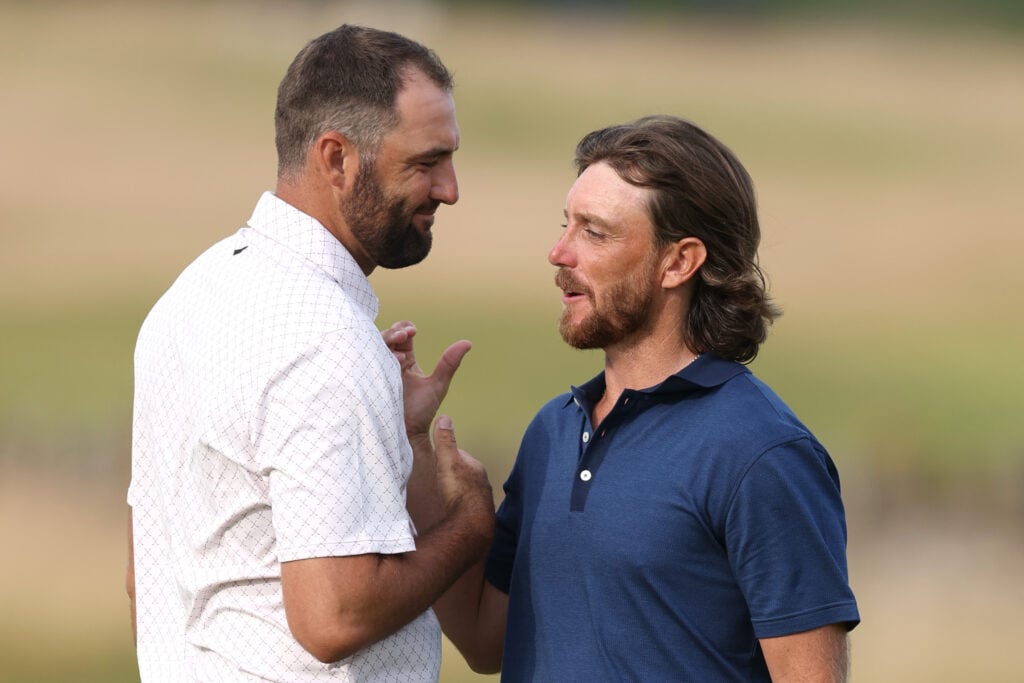 Scottie Scheffler with Tommy Fleetwood on the 18th green following their round on day one of the Genesis Scottish Open at The Renaissance Club