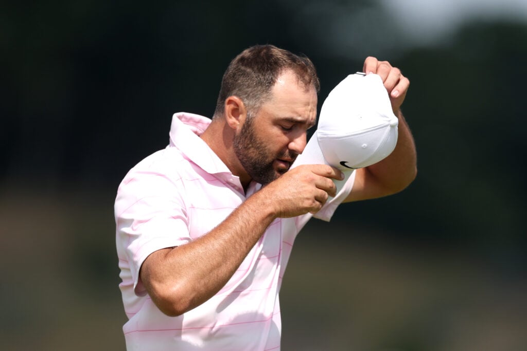Scottie Scheffler reacts after finishing his round on the ninth green on day two of the Genesis Scottish Open at The Renaissance Club