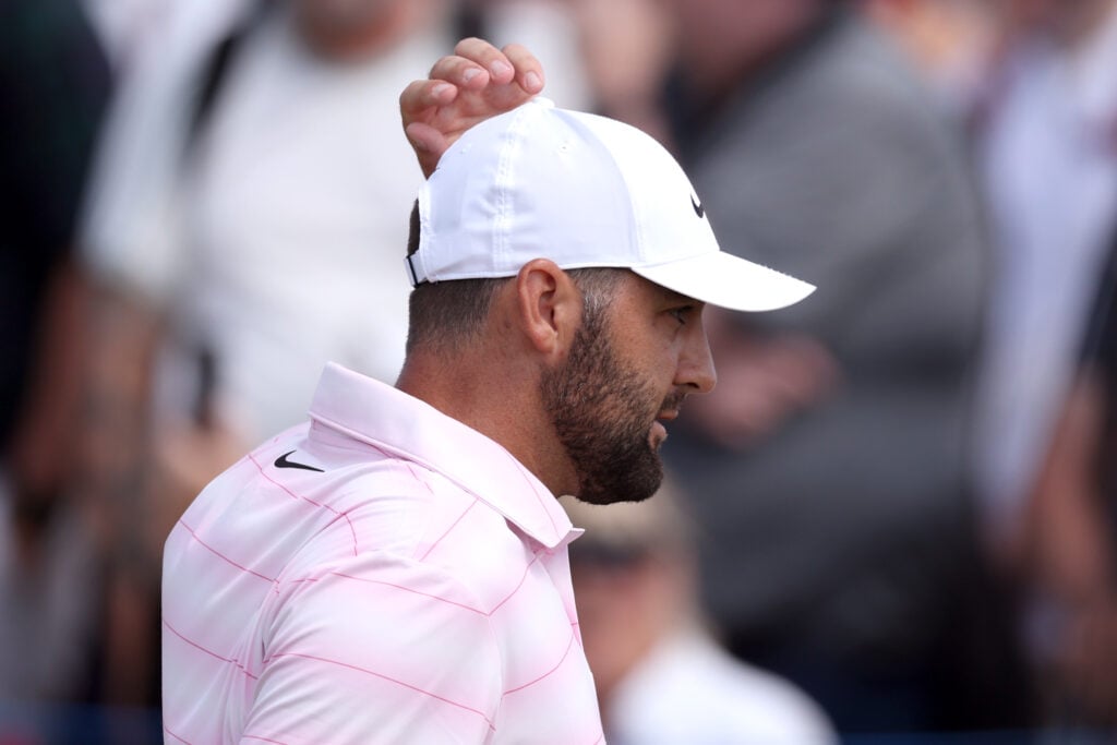 Scottie Scheffler reacts after finishing his round on the ninth green on day two of the Genesis Scottish Open at The Renaissance Club