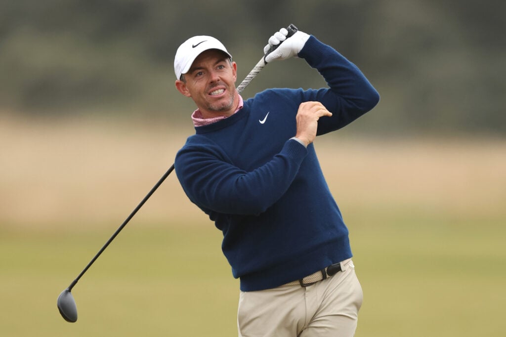 Rory McIlroy hits his second shot into the first hole at The Renaissance Club during the third round of the Scottish Open
