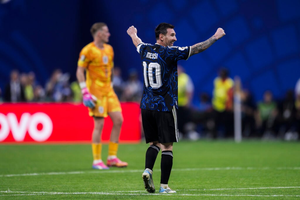 Lionel Messi (R) of Argentina celebrates next to Jordan Pickford of England during the FIFA World Cup 2026 semi final football match between England and Argentina. Argentina won 2-1 over England.