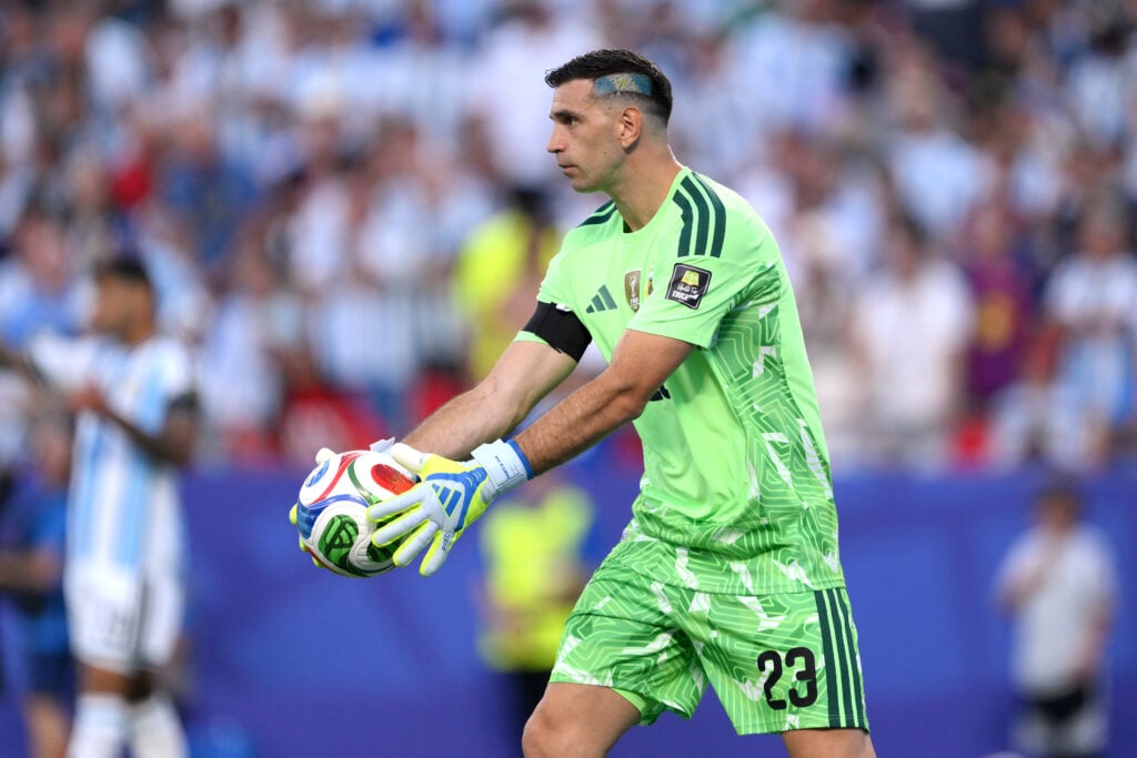 Emiliano Martinez #23 of Argentina controls the ball during the FIFA World Cup 2026 Quarter Final match between Argentina and Switzerland at Kansas City Stadium