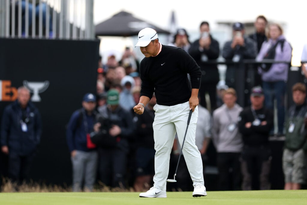 Tom Kim celebrates after winning the Genesis Scottish Open at The Renaissance Club