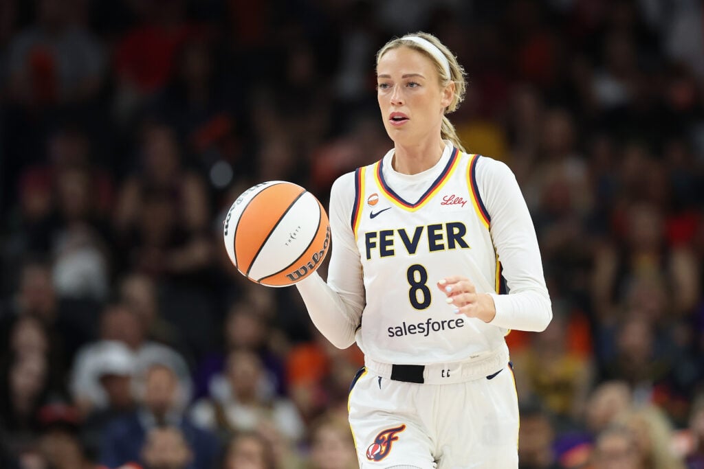 Sophie Cunningham #8 of the Indiana Fever handles the ball during the WNBA game at Mortgage Matchup Center.