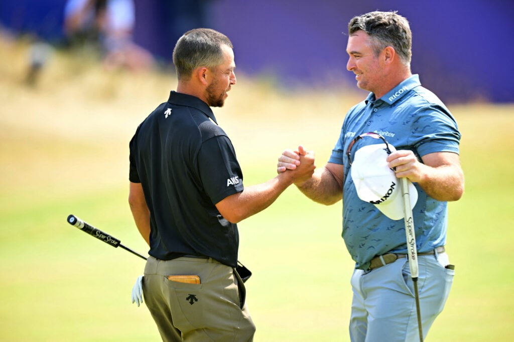 Xander Schauffele and Ryan Fox shake hands at The Open Championship 2026