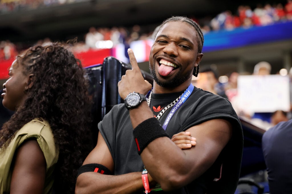 Noah Lyles poses before the FIFA World Cup 2026 Semi Final match between France and Spain at Dallas Stadium on July 14, 2026 in Arlington, Texas.