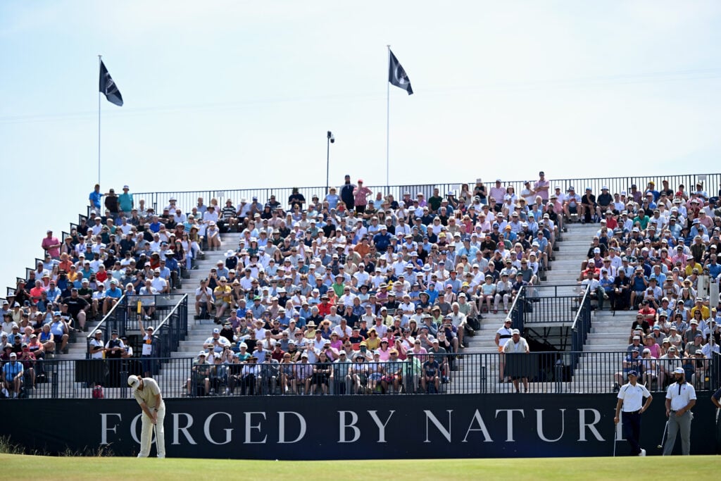 Tommy Fleetwood of England putts on the ninth green during Day One of the The 154th Open Championship at Royal Birkdale