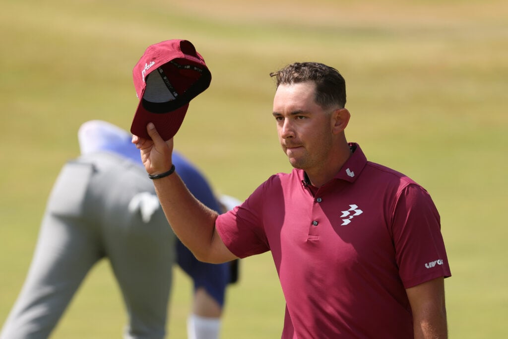 Lucas Herbert of Australia acknowledges the crowd on the 18th green following his round of 62 (-8), equaling the record of the lowest round in men's major history on day two of the The 154th Open Championship at Royal Birkdale