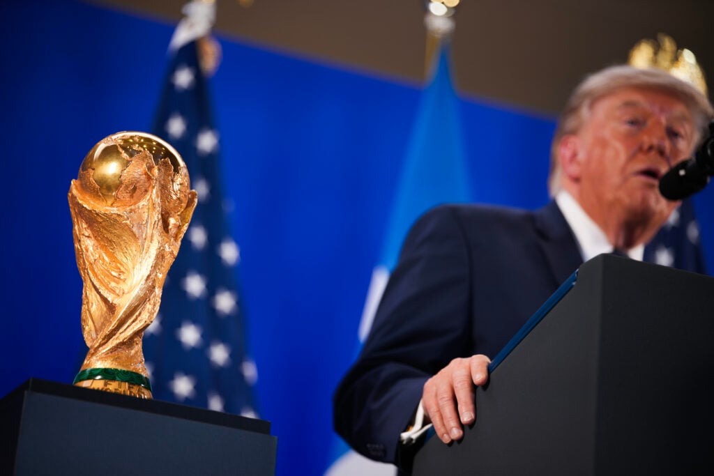 The FIFA World Cup Trophy is displayed as U.S. President Donald Trump speaks at a FIFA Reception at Trump Tower