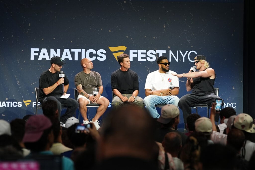 Chris Costa, Wesley Sneijder, Tom Brady, Karl-Anthony Towns, and Logan Paul speak onstage during the This is Why We Collect panel at Fanatics Fest NYC 2026