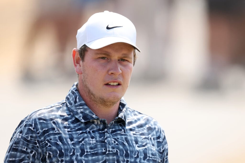 Robert MacIntyre of Scotland walks on the first hole on day three of the The 154th Open Championship at Royal Birkdale