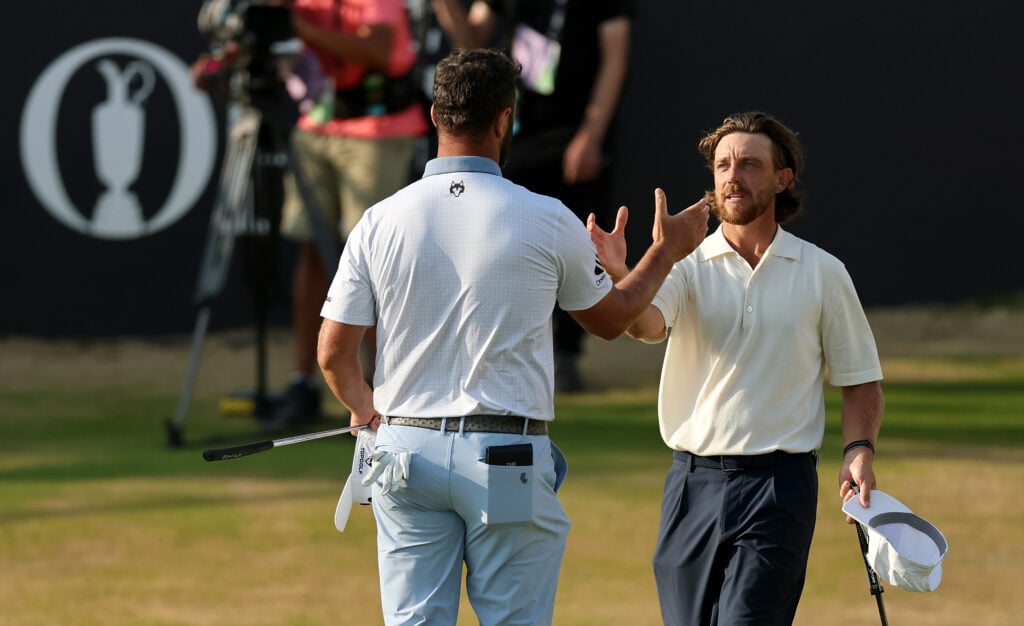 Tommy Fleetwood and Jon Rahm shake hands after the third round of The Open Championship
