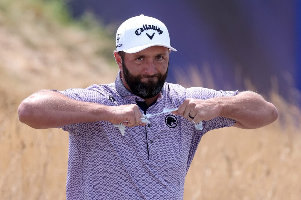 Jon Rahm rips his glove during the final round of The Open Championship