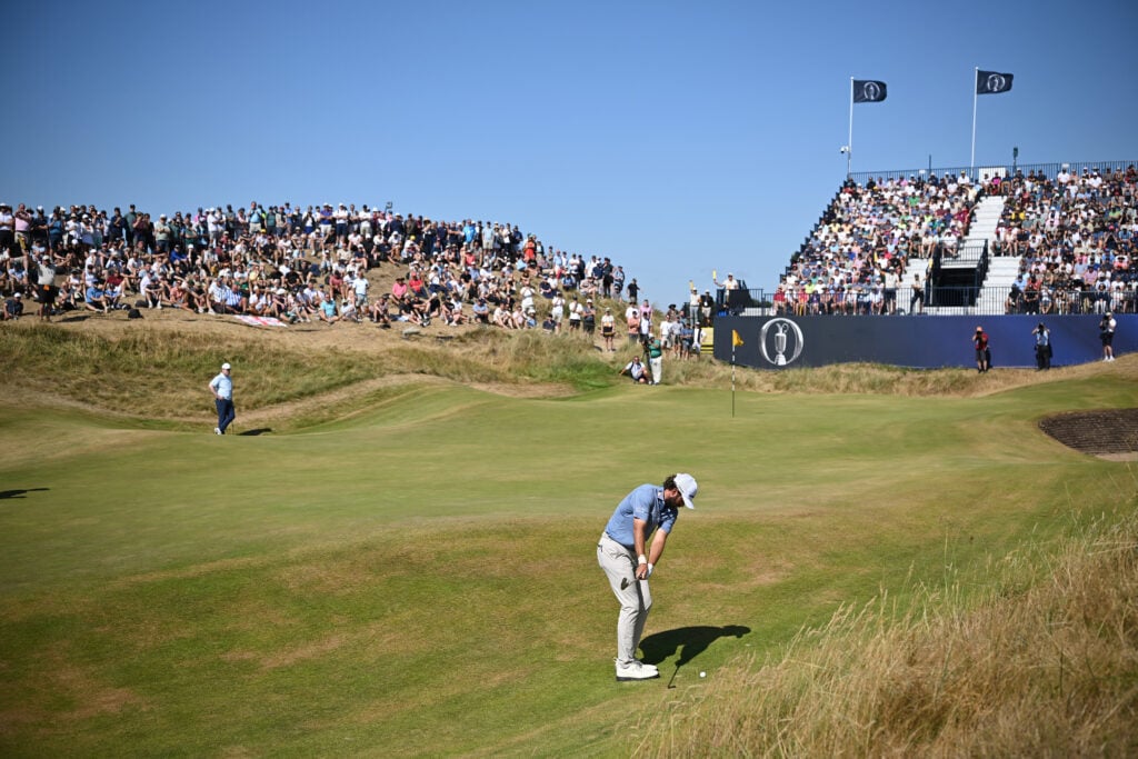Cameron Young chips onto the 17th green during the final round of The Open Championship