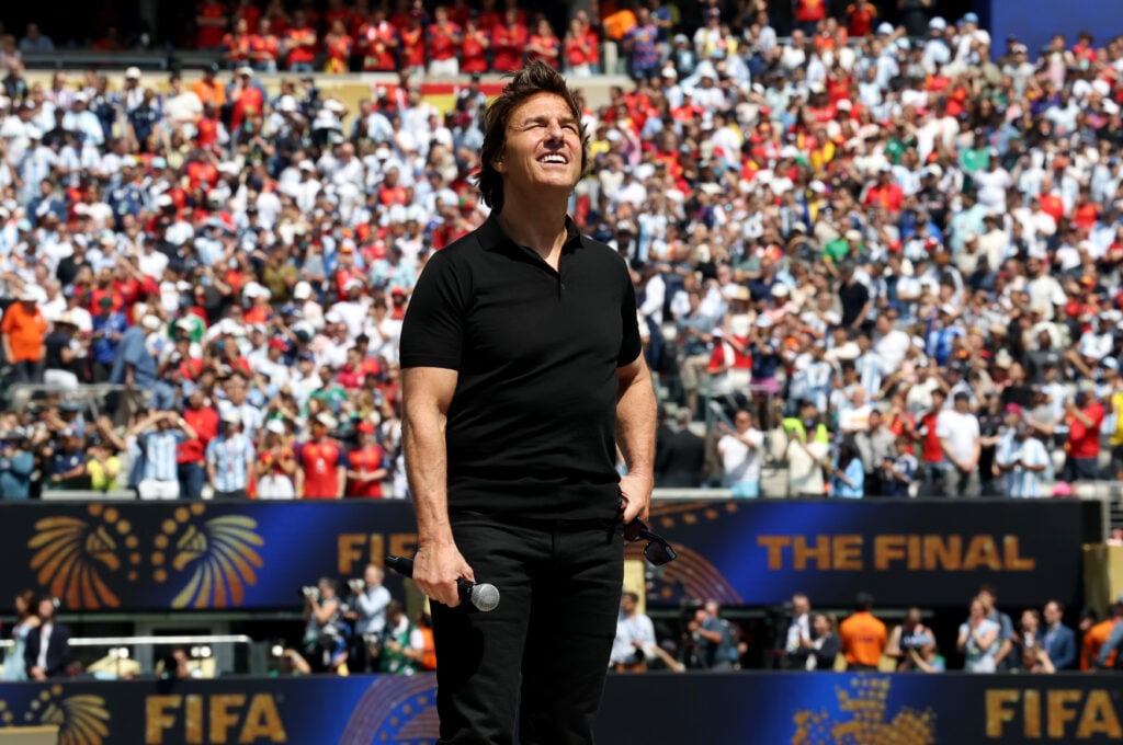 American actor and film producer Tom Cruise speaks on the field before the FIFA World Cup 2026 Final match between Spain and Argentina at New York New Jersey Stadium