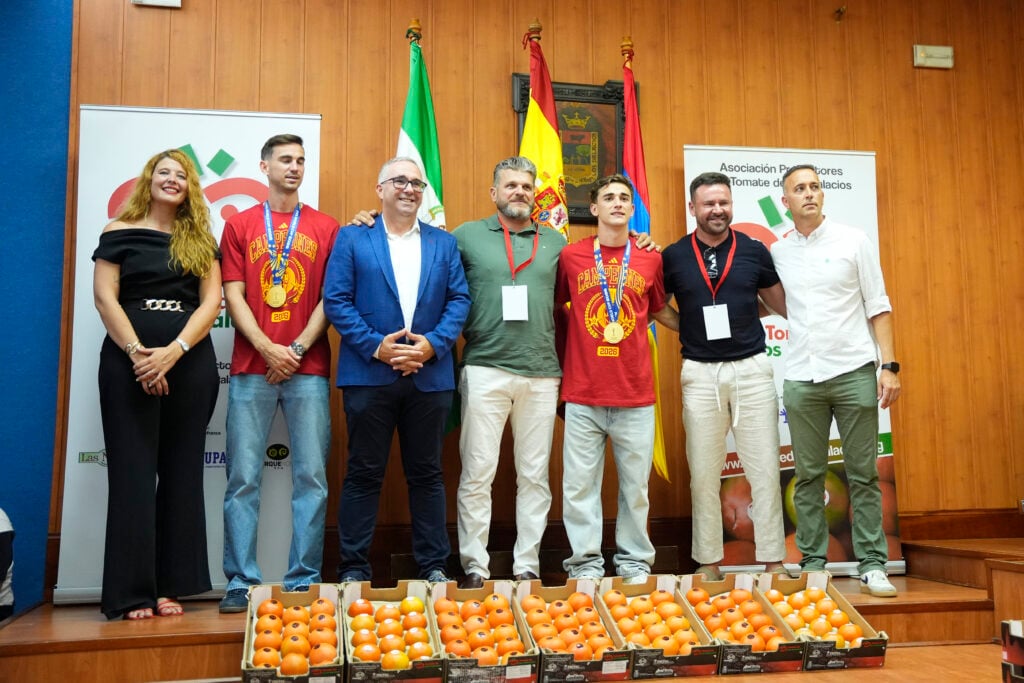 Spain national football team players Fabian Ruiz and Gavi pose for photos at a ceremony during which they receive an amount of tomatoes equivalent to their body weight in a tribute held in their hometown.