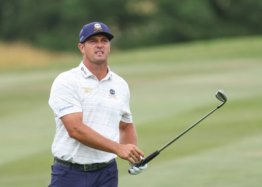 Bryson DeChambeau hits his second shot into the eighth hole during the third round of LIV Golf UK
